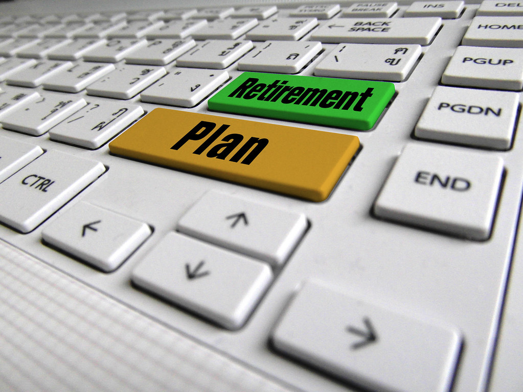 A keyboard with two buttons with label Retirement Plan, an illustration of the retirement plan options for the self-employed